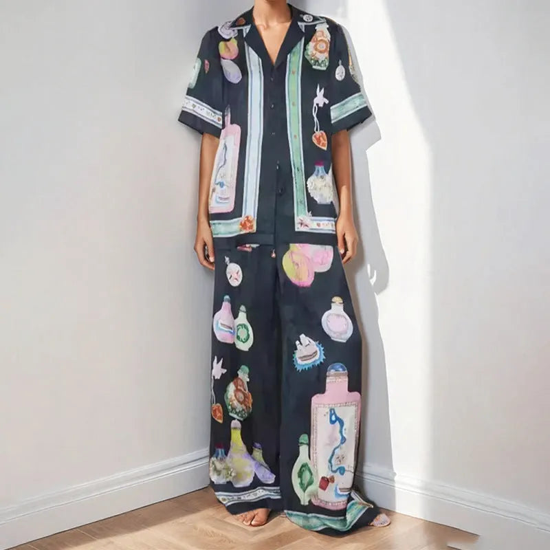 Black women's cardigan and trousers set with cartoon animation pattern
