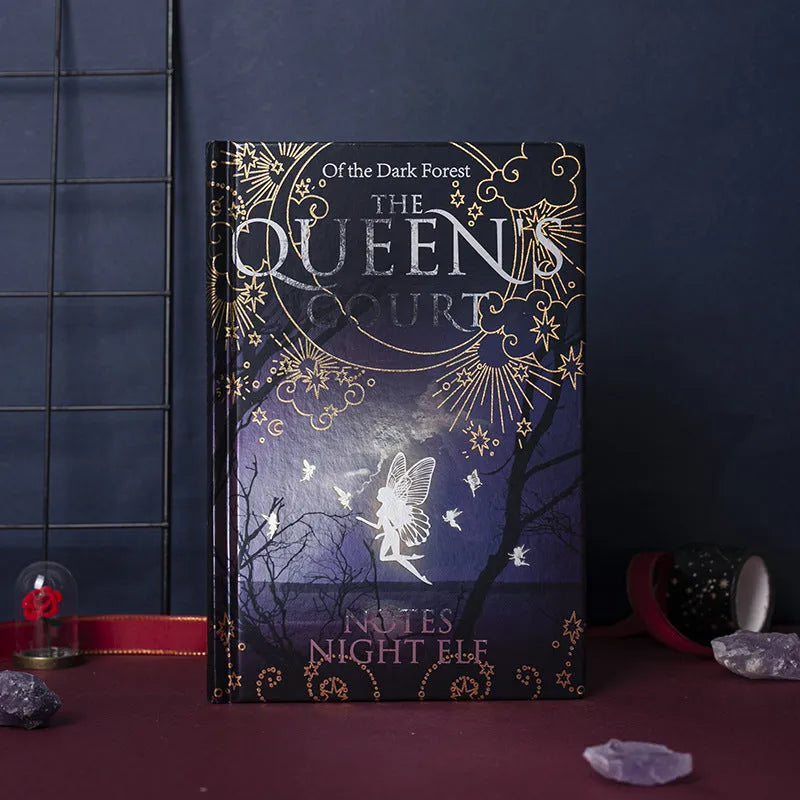 Blue A5 luminous hardcover notebook open to show full-colour illustrated interior pages.