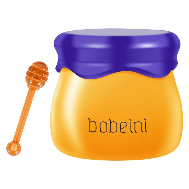 Vaseline Moisturising Lip Balm pot in blueberry or pomegranate flavour, 9g net content with applicator brush.