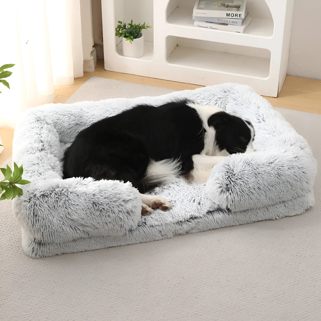 Plush round dog bed in a chosen colour, showing soft texture and raised edges, with a removable inner sleeve.