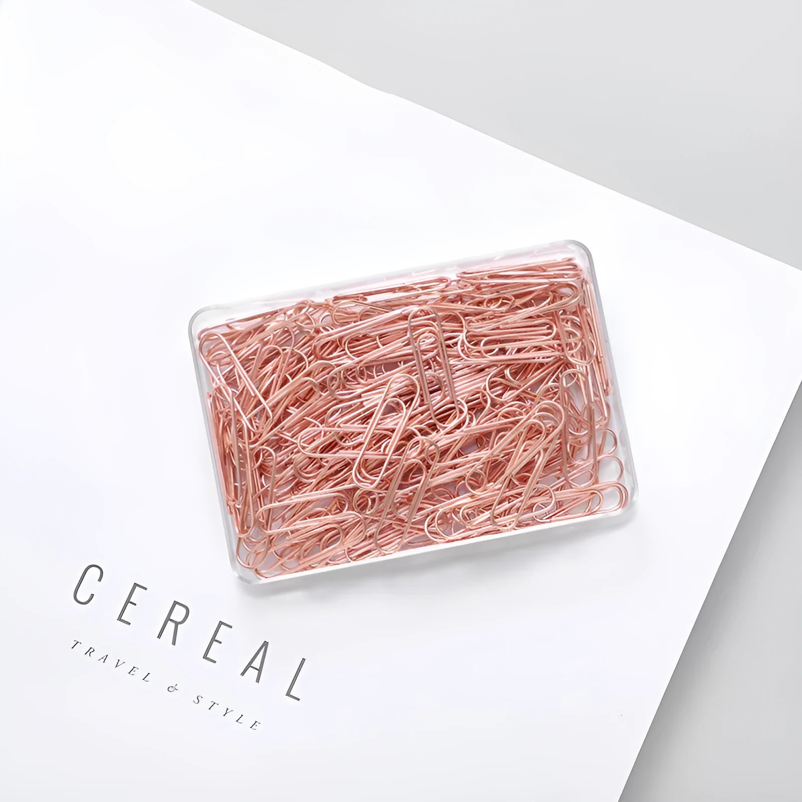Rose gold heart-shaped metal paper clips, 28mm size, shown in a pack of 100.