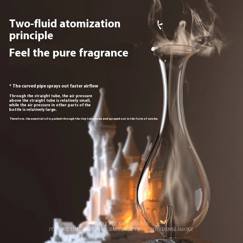 White medieval castle-shaped waterless aromatherapy machine with ambient light on a surface.