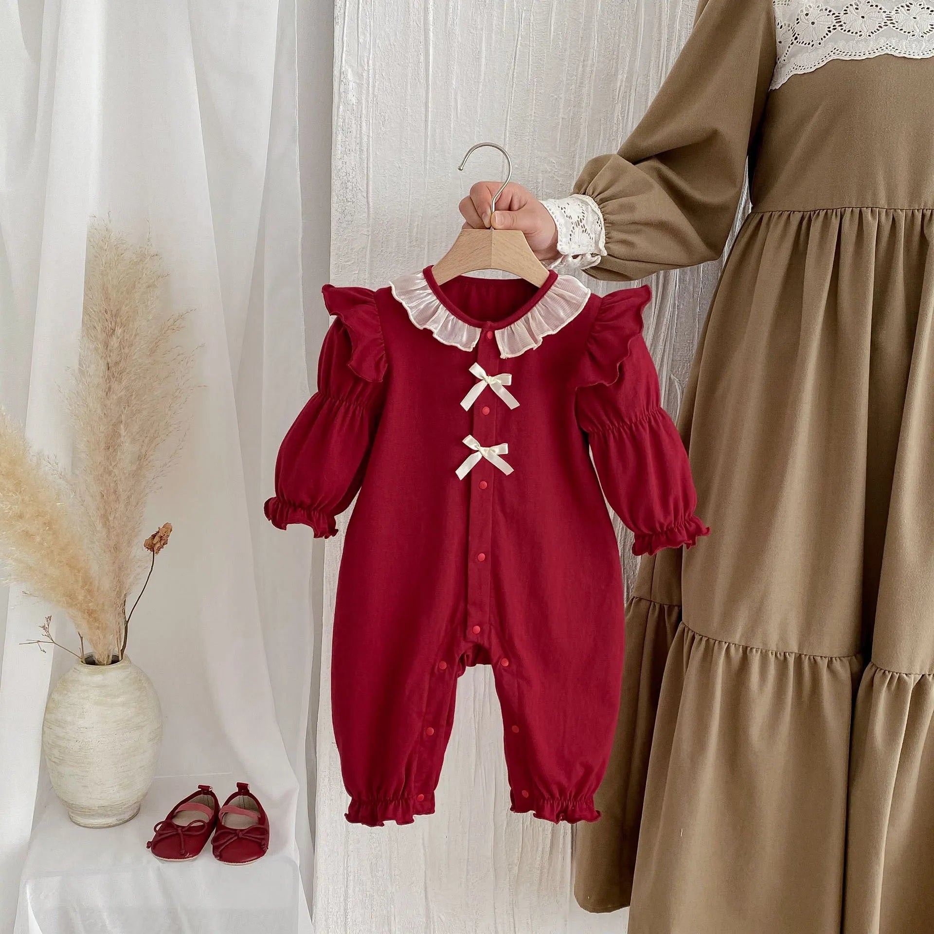 Red cotton long sleeve baby jumpsuit for autumn, double breasted climbing style, suitable for 66-90cm height