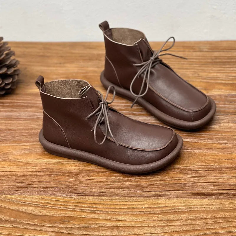 Women's cowhide boots with optional velvet lining, flat heel, round toe, and 9cm ankle sock in black and coffee colours