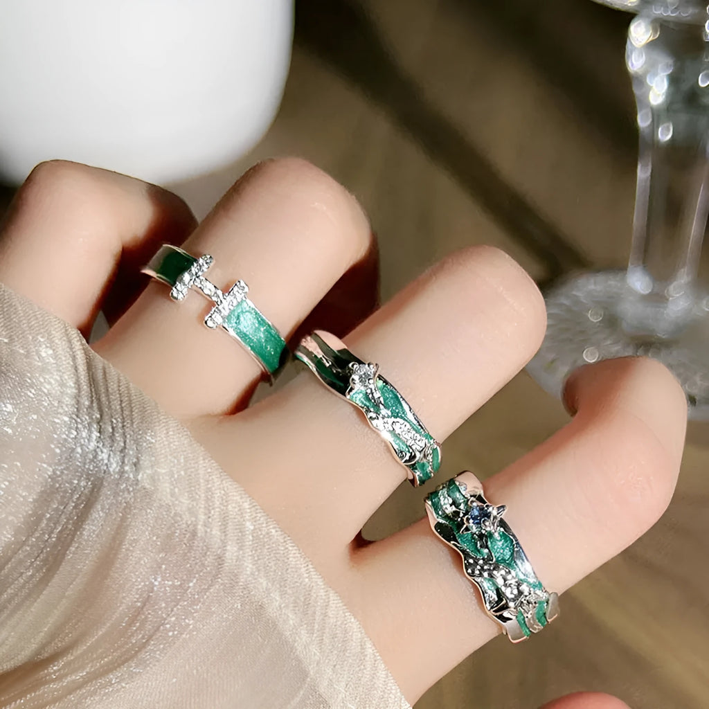 Mint green enamel asterism copper ring with folding irregular design and eight awn star elements