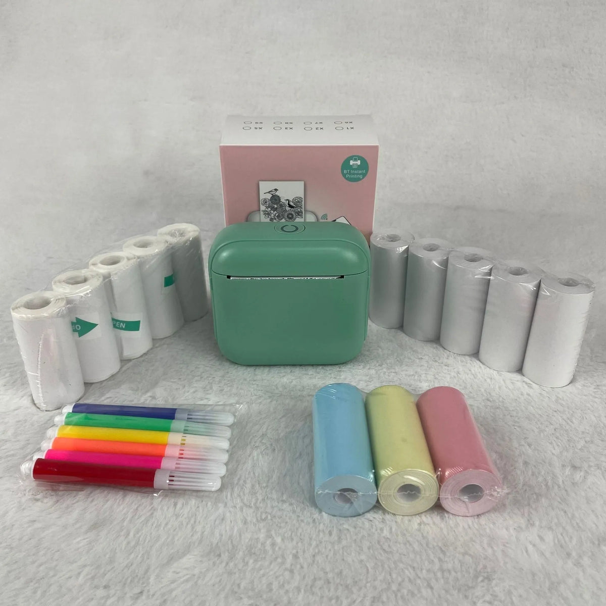 Mini Bluetooth thermal printer 85x35x80mm for household label printing, available in beige, green, or purple.