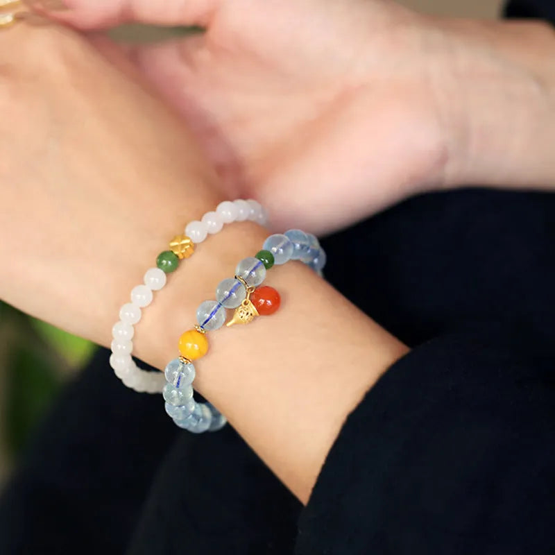 Women's aquamarine bracelet with 8mm geometric beads in iced aquamarine colour and ethnic retro style