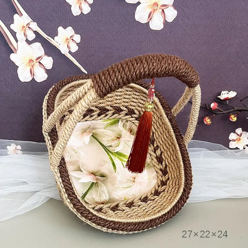 Hand-woven hemp rope straw basket in coffee brown colour, 19cm diameter.
