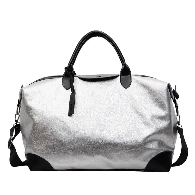 Women's large capacity hand-carry travel bag in black or silver with 36-55 litre capacity