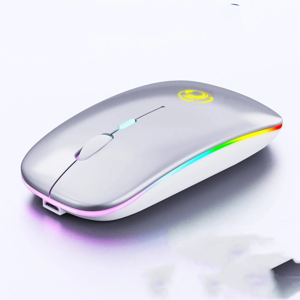 Black and white dual-mode wireless silent mouse with luminous charging scroll wheel on a desk.