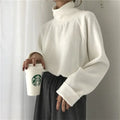 Women's solid colour loose-fit long sleeve top with a half-high collar in white, apricot, or black.