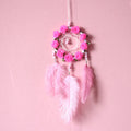 Pink ostrich feather dreamcatcher wind chime wall ornament measuring 10cm