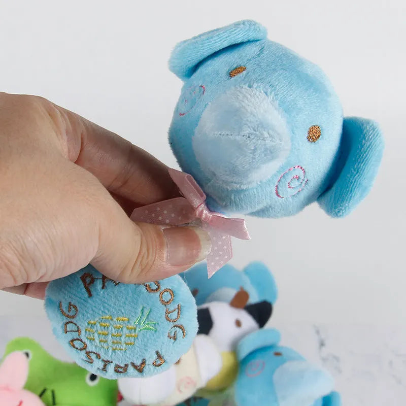 Dog plush squeaker toy with cotton rope tug in animal designs
