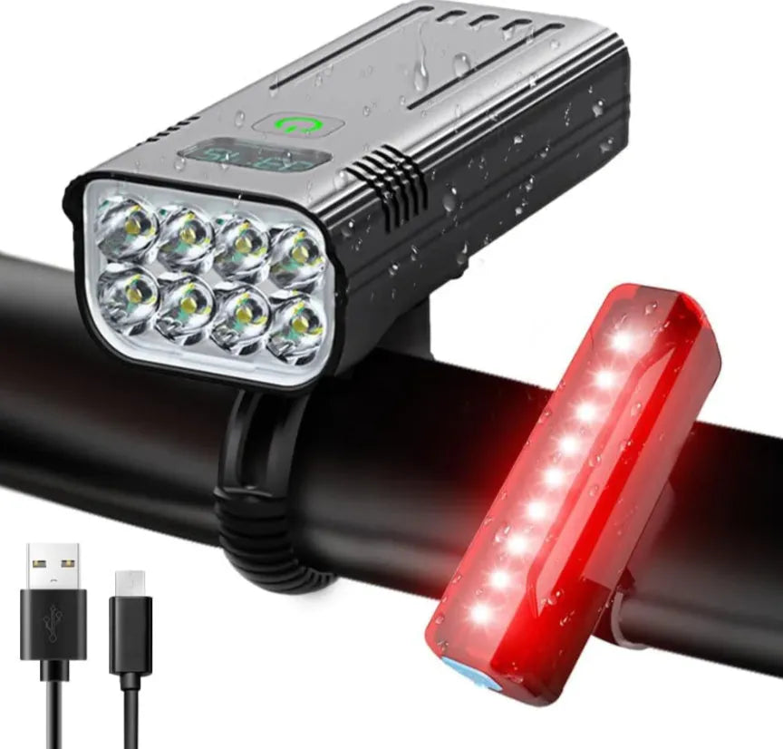 Black aluminium alloy USB rechargeable bicycle headlight with digital power display mounted on handlebars