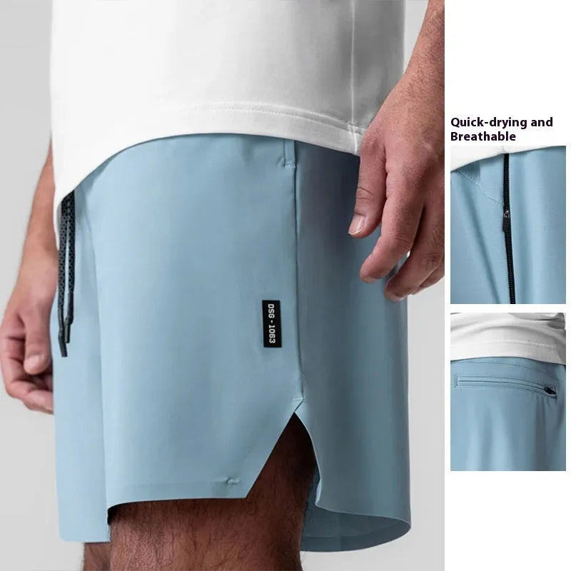 Men's grey seamless sports shorts with a straight-leg, knee-length cut on a mannequin.