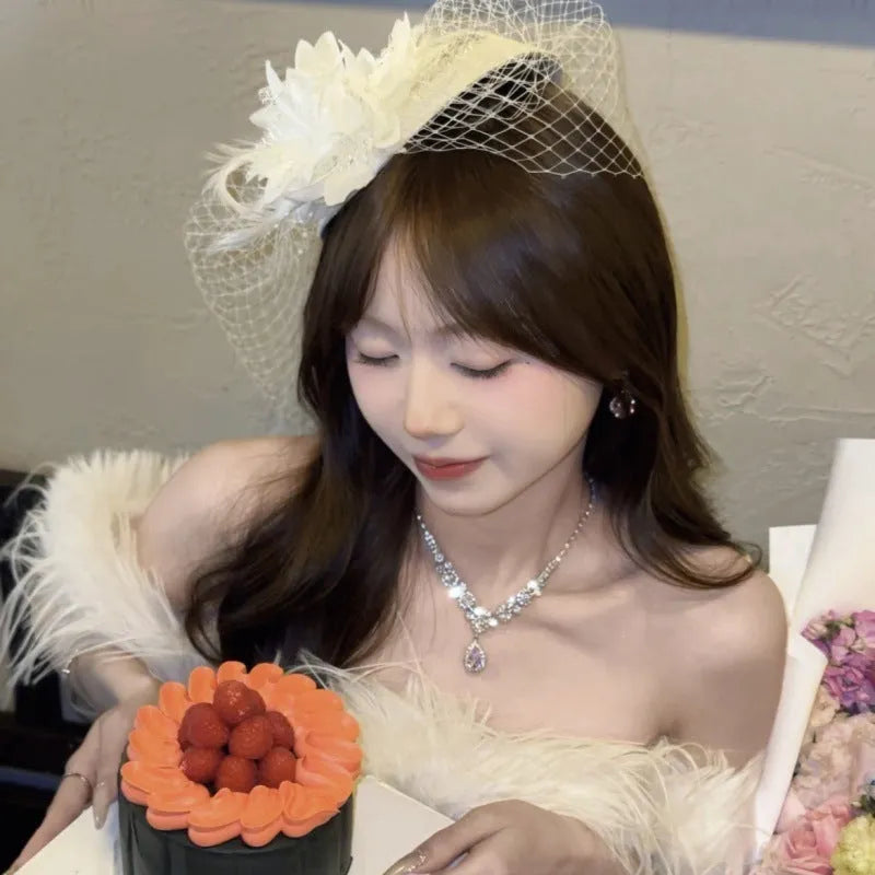French retro feather headdress flower in mesh, shown in pink, white, or black for dinner socialite gatherings.