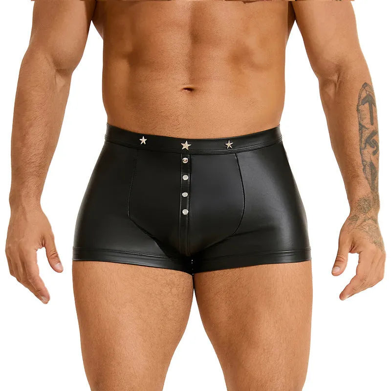 Black men's leather-look shorts with U-pouch front design on a model