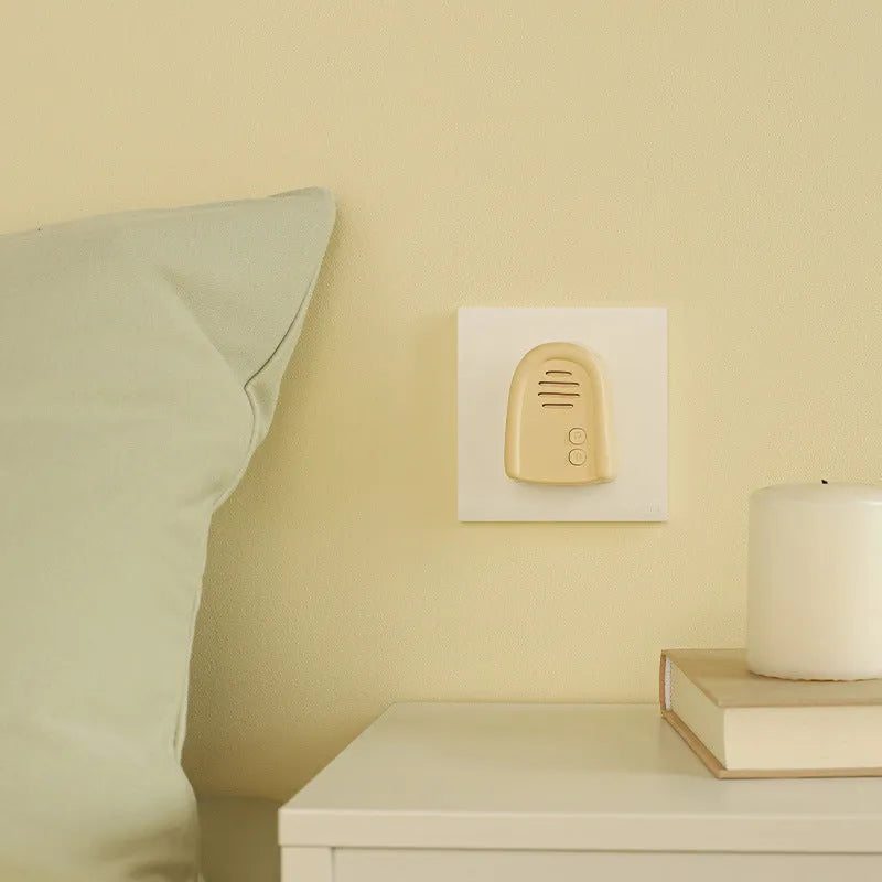 Household wireless plug-in doorbell in milky yellow and white colour options with self-generating technology