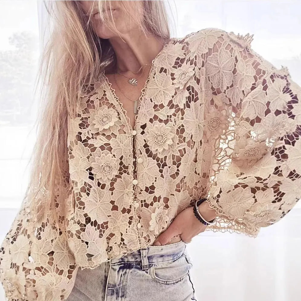 Women's loose-fitting lace cardigan with 3D floral decoration and V-neck in black.