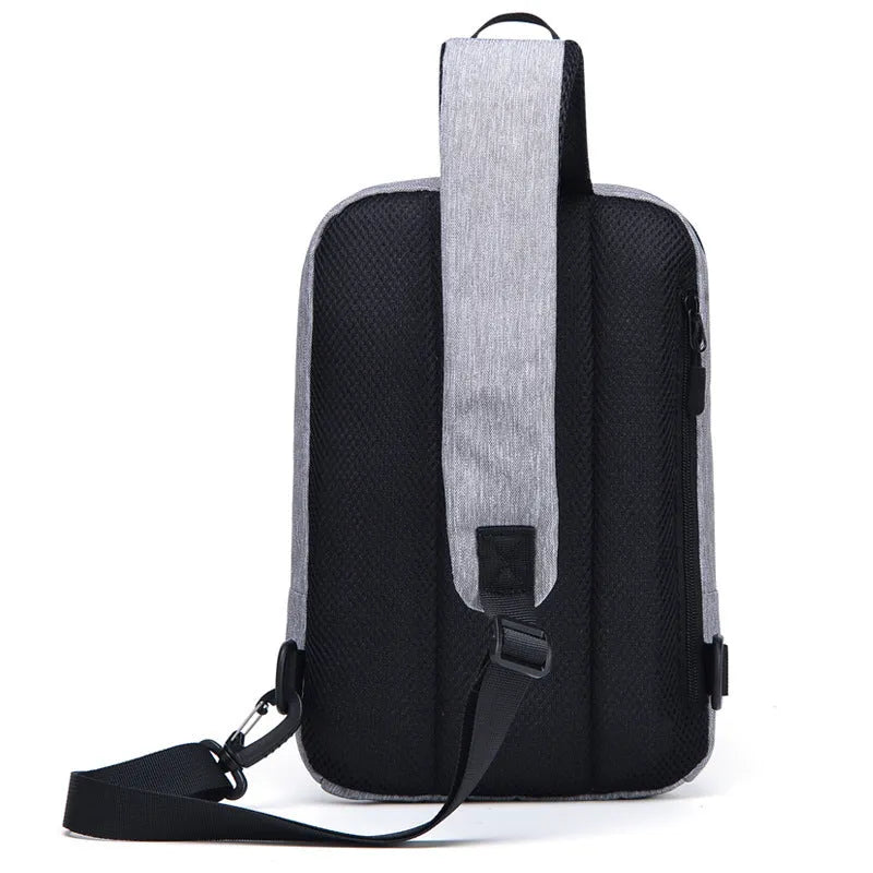 Men's Oxford cloth chest bag with zipper closure, embossed pattern, and car suture detailing in black 21x8x32cm