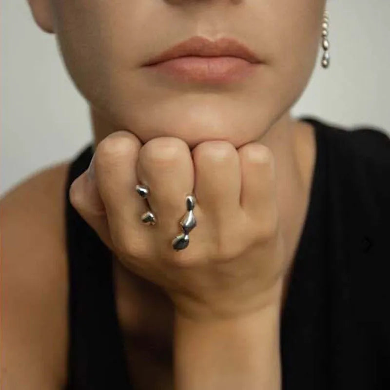Brass opening ring with spherical design in gold or silver colour options