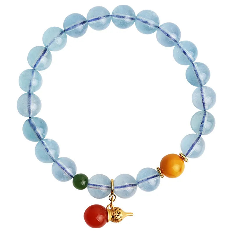 Women's aquamarine bracelet with 8mm geometric beads in iced aquamarine colour and ethnic retro style