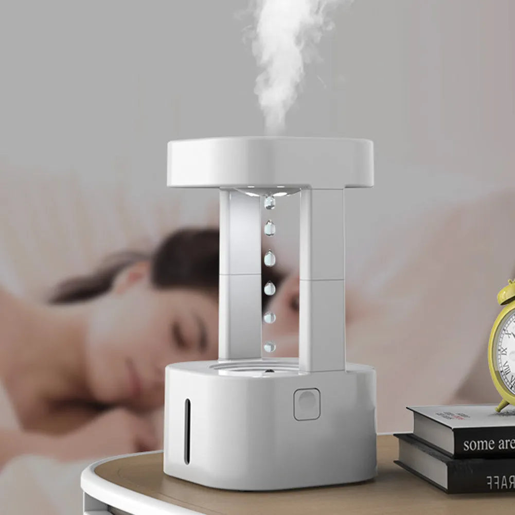 Creative anti-gravity water drop humidifier with optical water droplet illusion and colour lighting