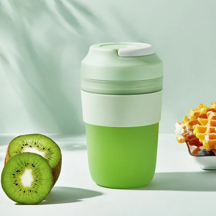 Portable rechargeable blender juicer cup 400ml capacity with four stainless steel blades in purple, green, and orange colour options