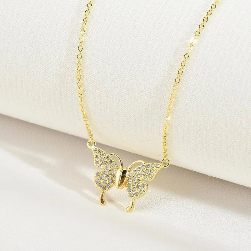 Women's titanium steel clavicle chain with magnetic snap butterfly pendant in gold or silver finish