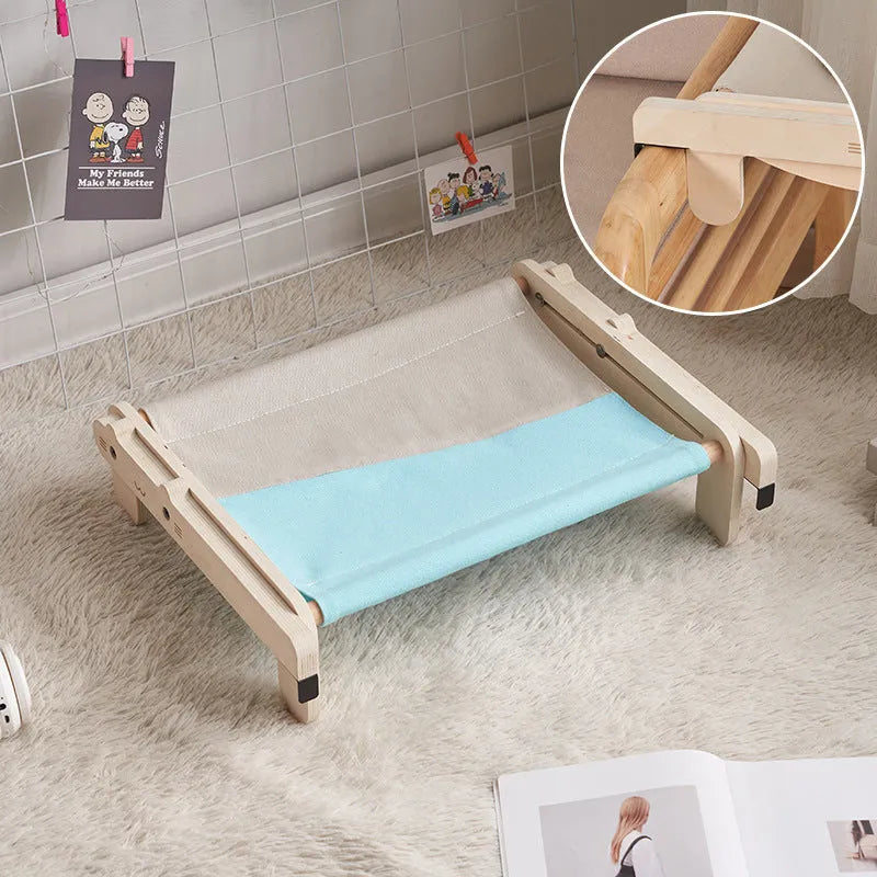Solid wood cat bed with a removable fabric cover, shown in a grey colour option.