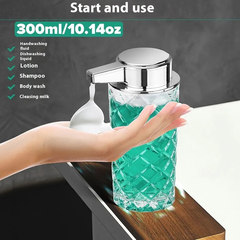 Silver automatic soap dispenser with sensor and USB-C charging port on a bathroom countertop