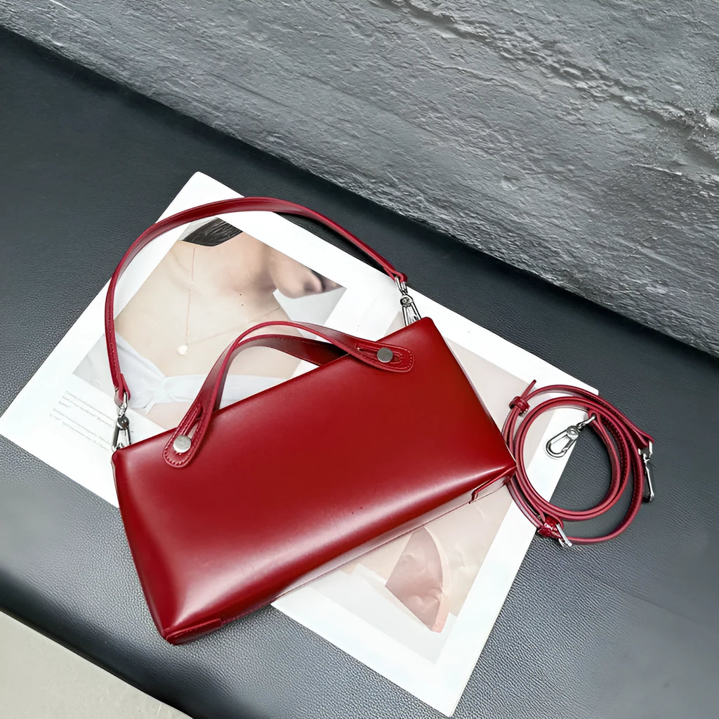 Genuine leather messenger shoulder bag in Wine Red, horizontal square shape, visible sewing thread detailing