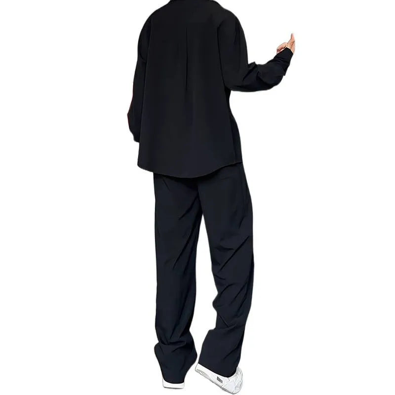 Men's black casual two-piece suit with long sleeve polo shirt and trousers in slim fit design