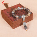 Men's gradient coloured glaze ceramic bracelet with Yonghe blessing charm and polished beads.