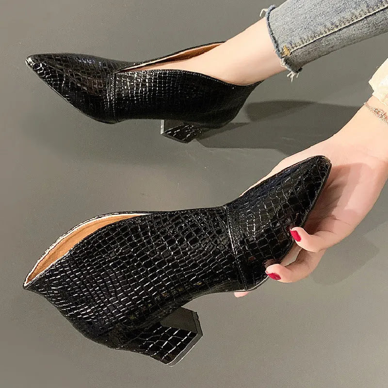 Women's black V cut pointed toe embossed Martin boots with chunky heel