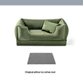 Waterproof dog kennel with removable washable mat in dark green colour showing outdoor placement