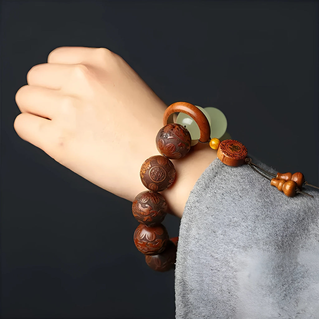 Rosewood bracelet with carved Fu character in amass fortunes colour on flexible 20mm ring