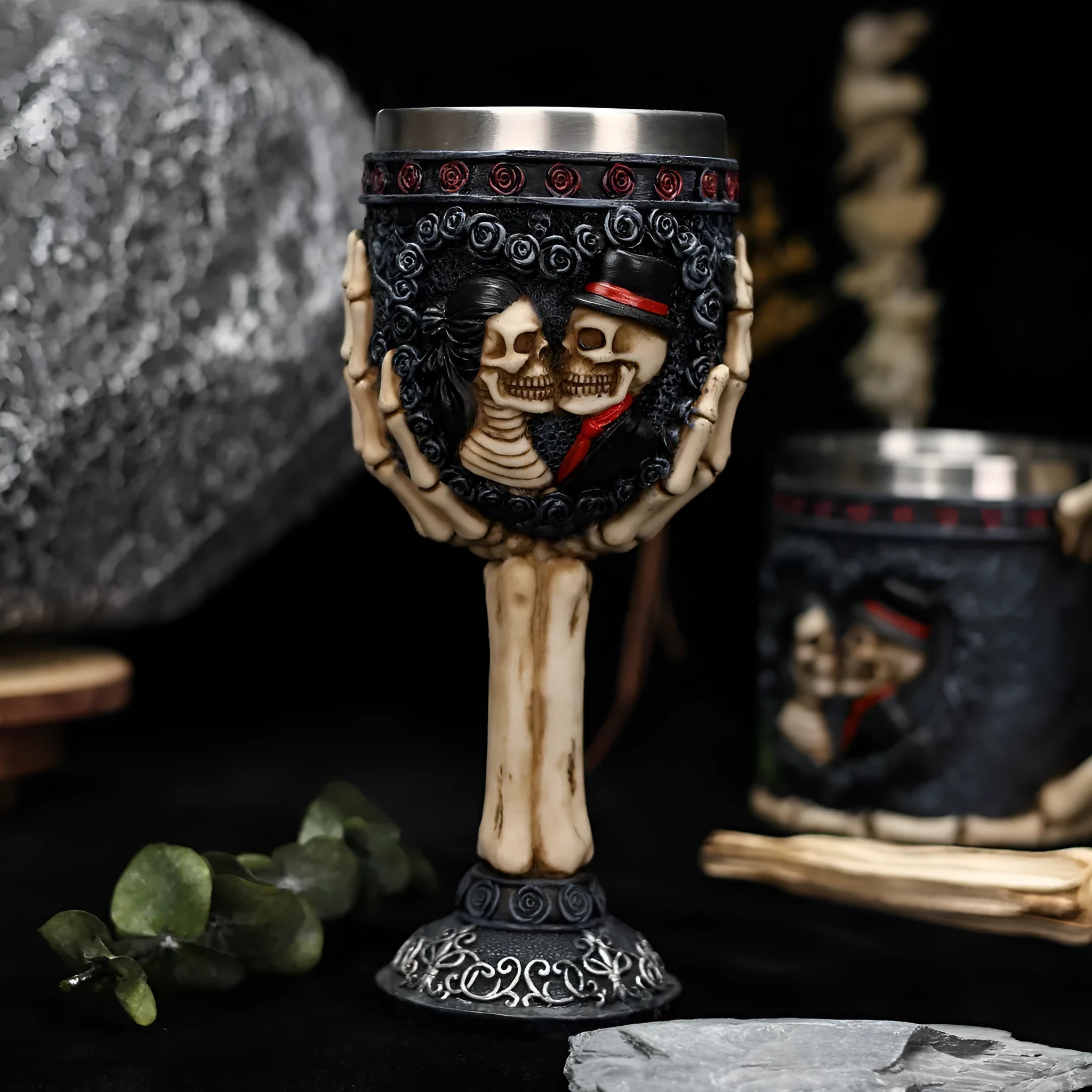 Stainless steel goblet with a red and black resin skeleton design, holding 200ml.