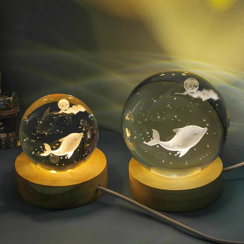 Transparent crystal ball night lamp with 3D carved jellyfish design, showing 6cm size on round base.