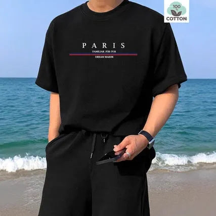 Man wearing a loose-fitting short-sleeved pure cotton t-shirt with a printed design in apricot colour.