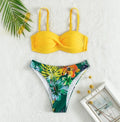 Split push up hard bag bikini swimsuit with matching briefs in multiple colours on a mannequin.