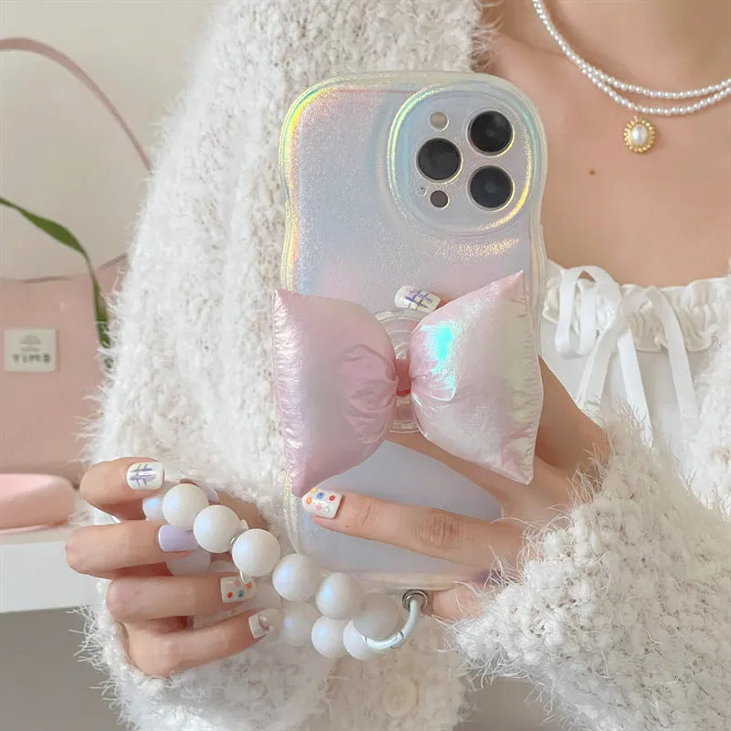 Soft silicone iPhone case with laser sparkle powder and bowknot design in pink