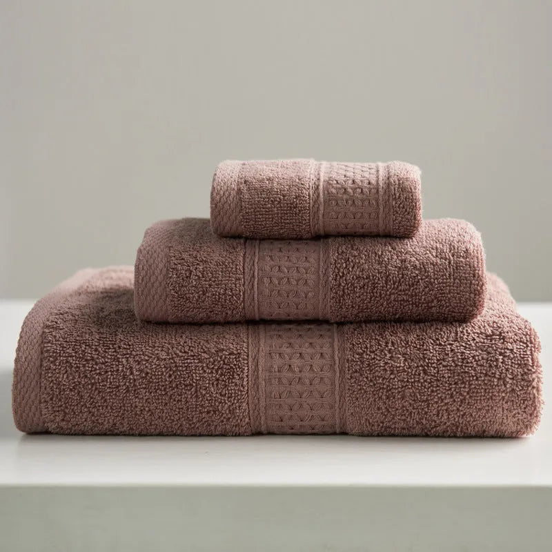 Pure cotton 3-piece towel set with square towel 33cm, hand towel 32x73cm, and bath towel 70x140cm in assorted colours