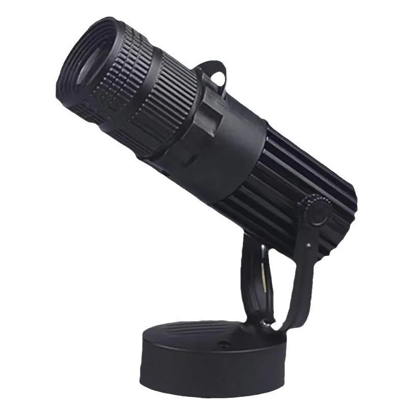 Black aluminium surface-mounted LED spotlight with open design for commercial lighting.