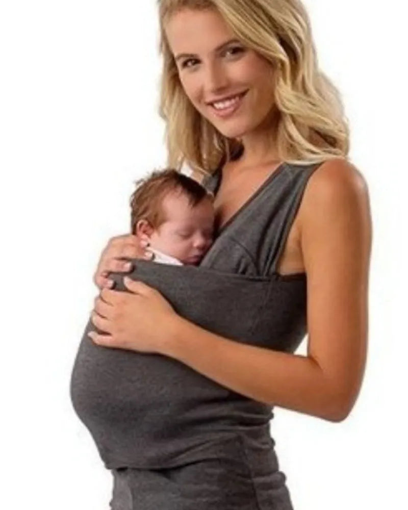 Loose-fit green cotton T-shirt for women with a round neck and short sleeves on a hanger.