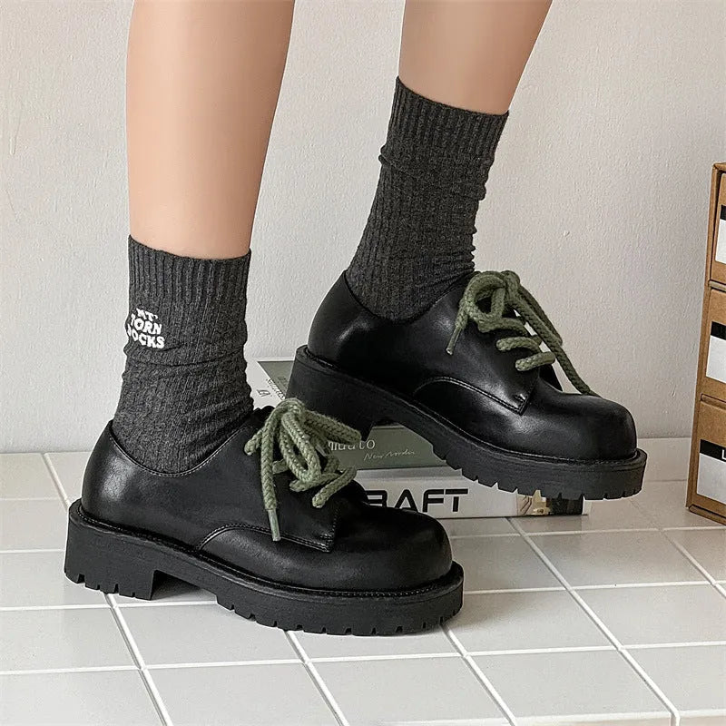 Big Head Derby unisex casual platform shoes in microfiber with a rubber sole.