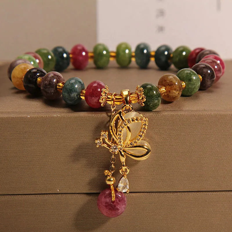 Colourful tourmaline bead and butterfly charm on women's alloy bracelet
