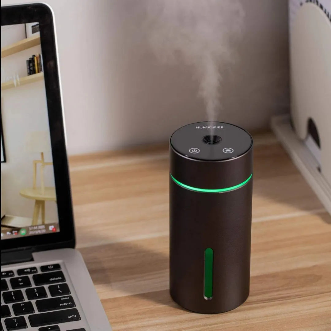 Black aluminium alloy portable car air humidifier and essential oil diffuser with night light on
