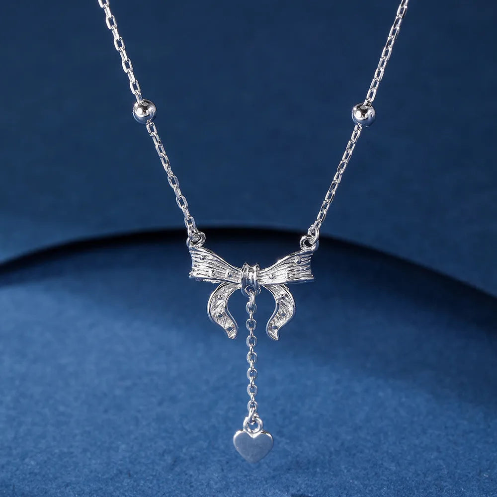 S925 pure silver butterfly heart pendant on an adjustable O-ring clavicle chain necklace.
