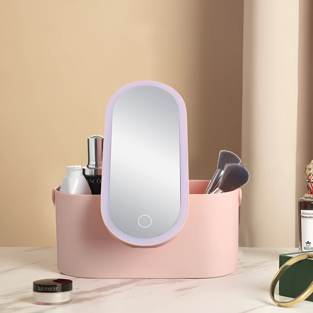 Pink gradient portable makeup storage box with built-in LED mirror, showing USB port and compact dimensions.